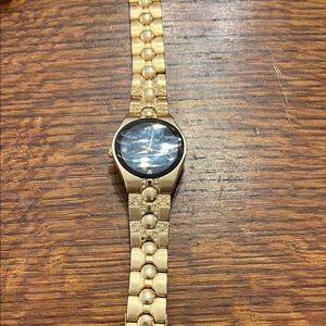 Elegant Gold Watch with Pearl Accents